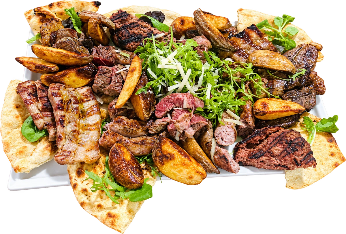 Vassoio di carne con patate e verdure