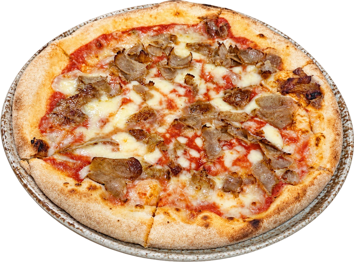 Una pizza di La Pola sul suo piatto